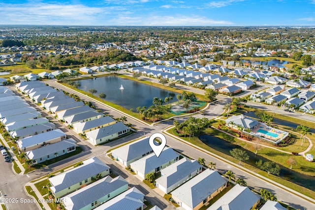 drone / aerial view featuring a water view