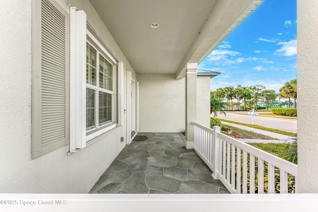 balcony featuring covered porch