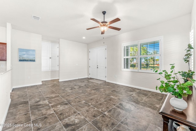 empty room with ceiling fan