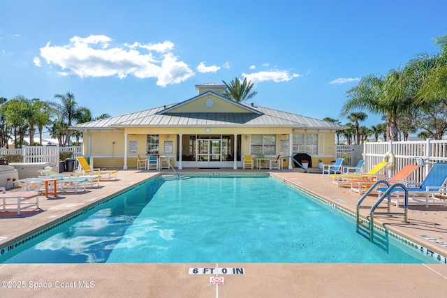 view of pool featuring a patio