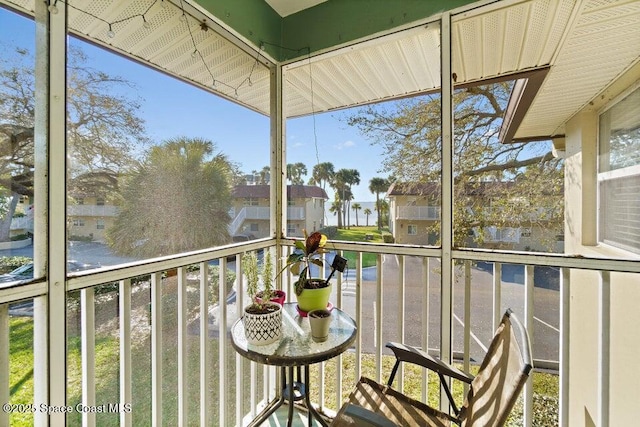 unfurnished sunroom featuring a healthy amount of sunlight