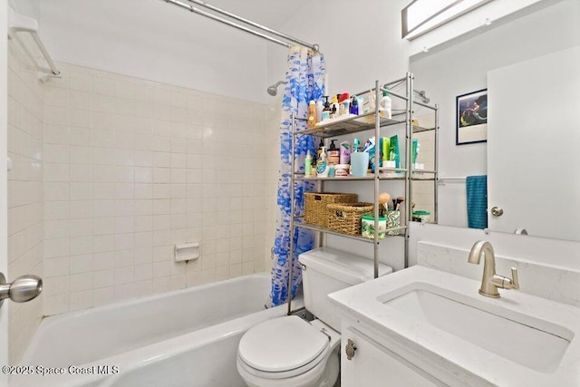 full bathroom with toilet, vanity, and shower / bath combination with curtain