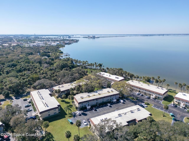 drone / aerial view with a water view