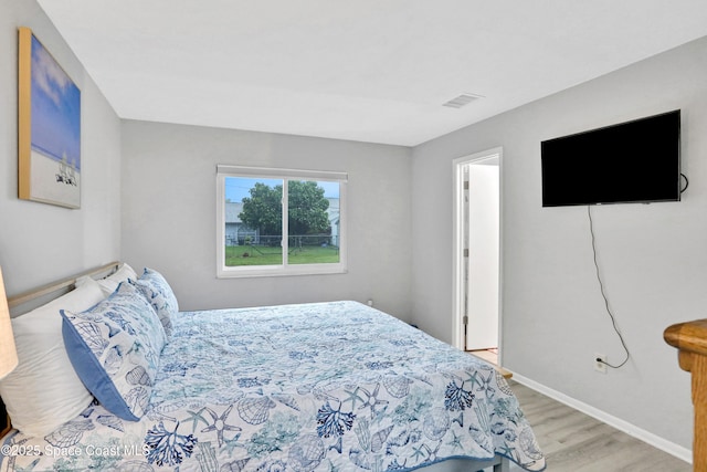 bedroom featuring light hardwood / wood-style floors