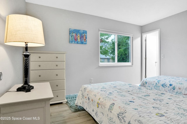 bedroom featuring light hardwood / wood-style floors