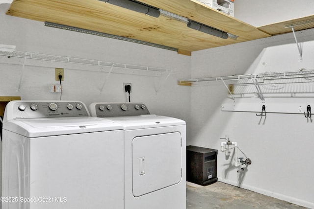 laundry area featuring separate washer and dryer