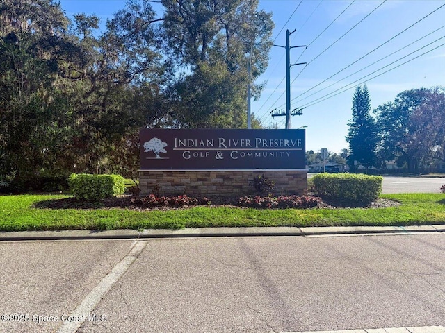 view of community sign