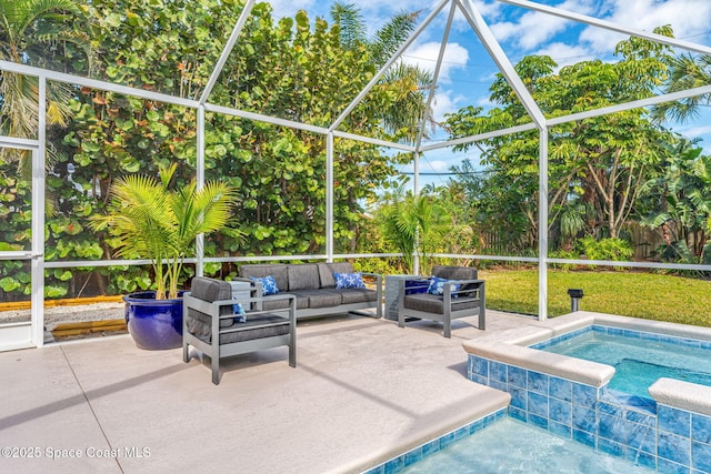 view of swimming pool featuring outdoor lounge area, a lanai, and a patio