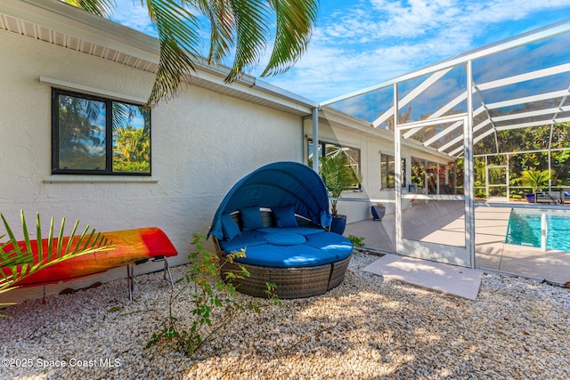 view of patio with a lanai