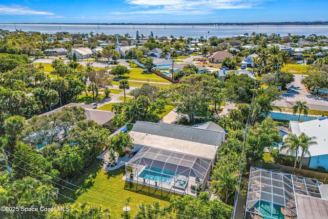 bird's eye view with a water view