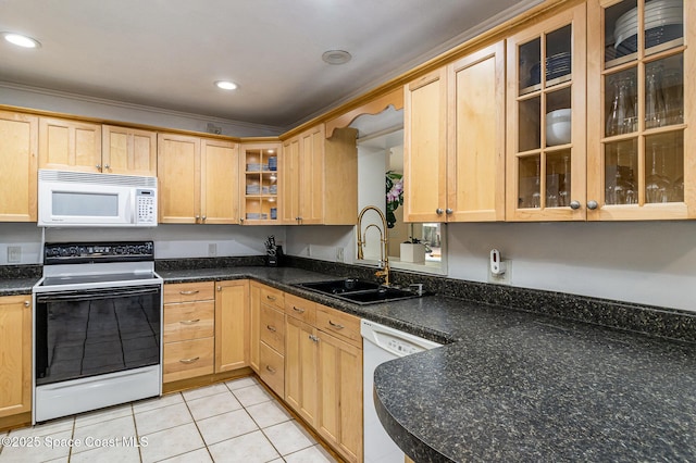 kitchen featuring sink, white appliances, ornamental molding, light tile patterned floors, and light brown cabinetry