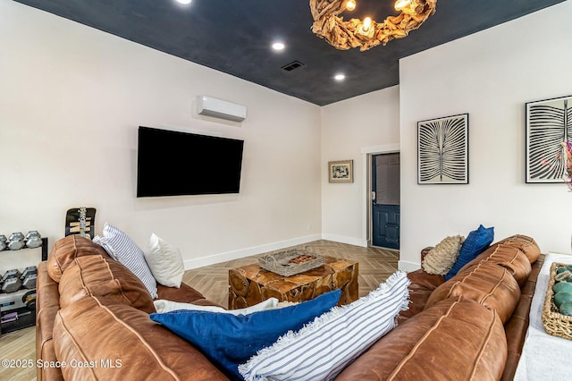 living room with parquet floors and a wall mounted air conditioner