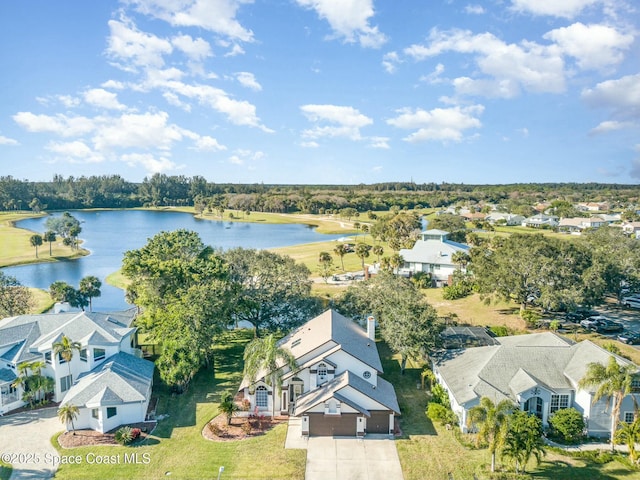 drone / aerial view with a water view