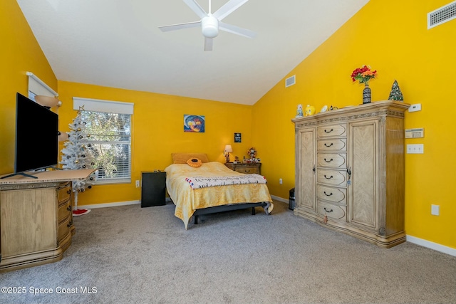 carpeted bedroom with lofted ceiling and ceiling fan