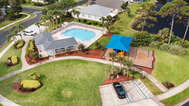 drone / aerial view featuring a water view