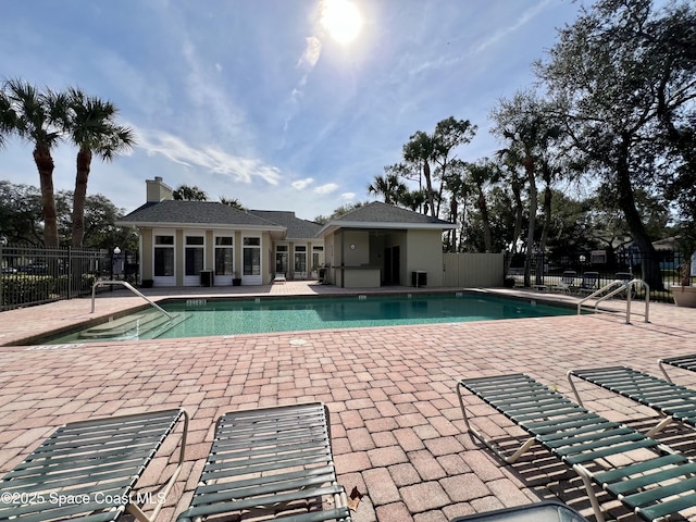 view of pool featuring a patio area