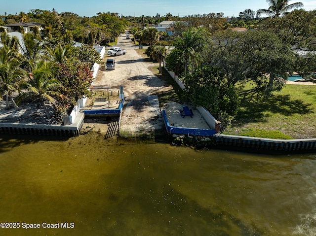 drone / aerial view with a water view