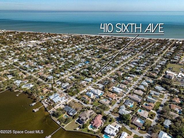 aerial view featuring a water view