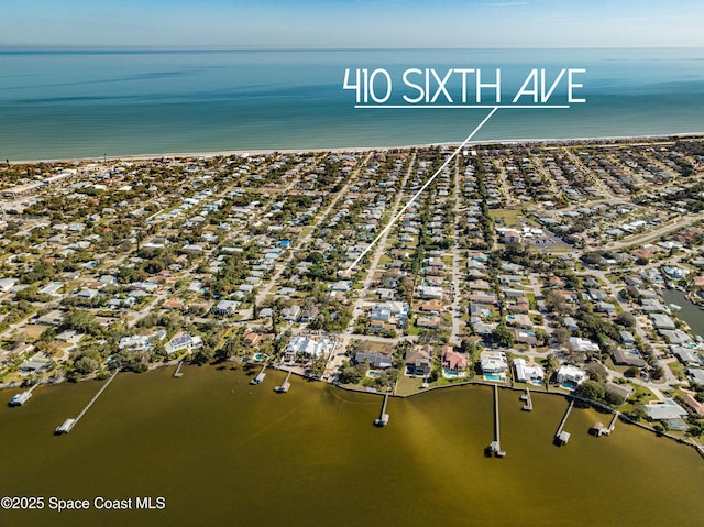 bird's eye view with a water view