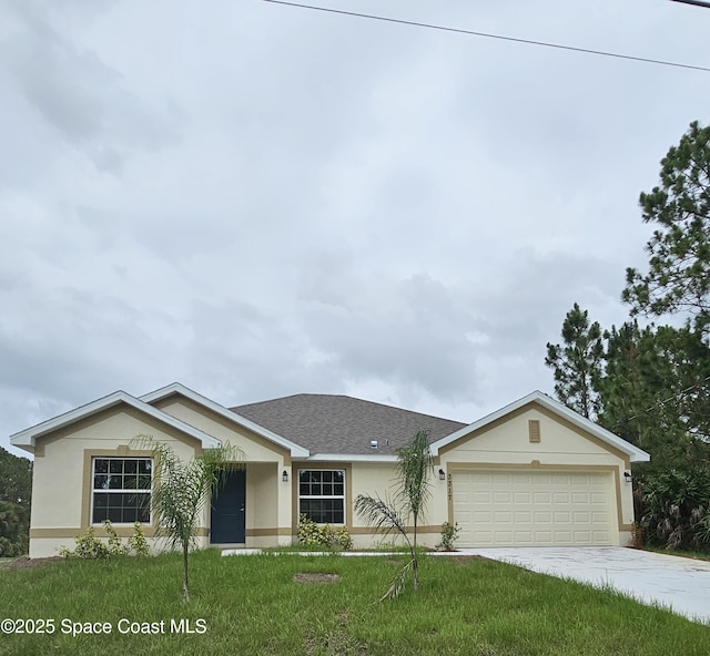3317 Fitzpatrick Ave SW, Palm Bay, FL 32908 - single story home featuring stucco siding, concrete driveway, an attached garage, and a front yard
