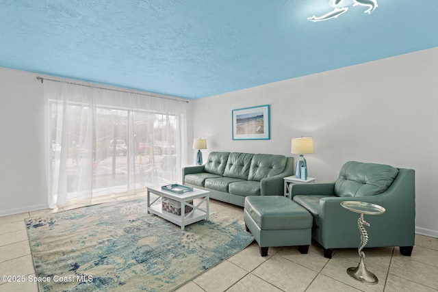 tiled living room with a textured ceiling