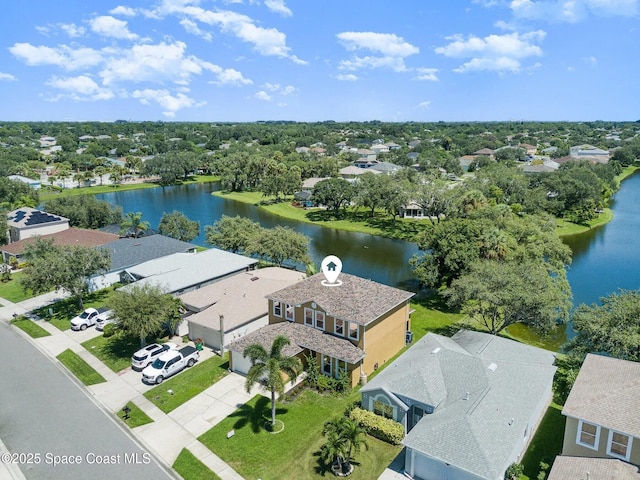 bird's eye view with a water view