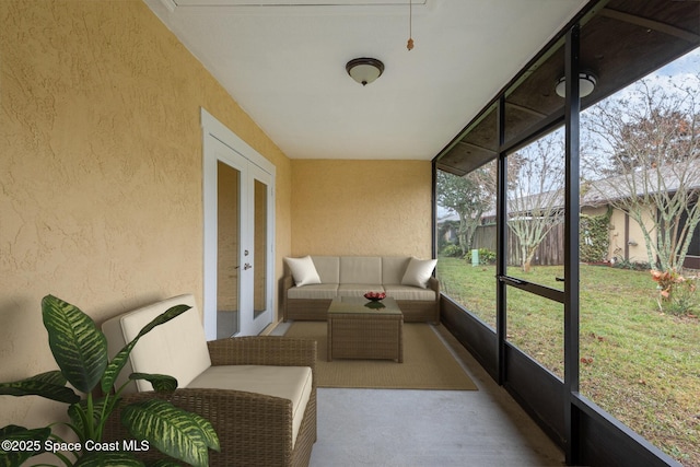 sunroom featuring french doors