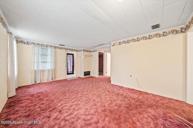 empty room with carpet flooring