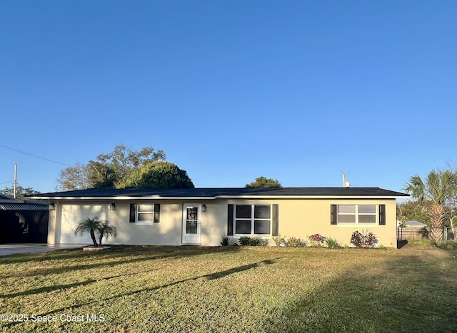 single story home with a front lawn