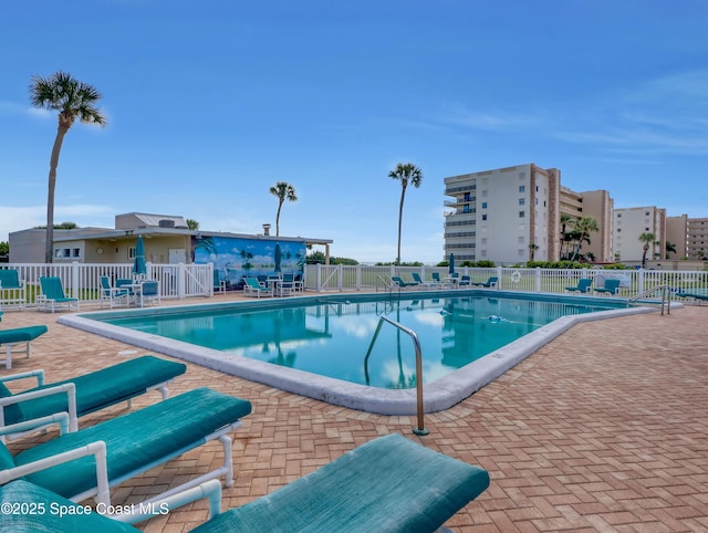 view of pool featuring a patio