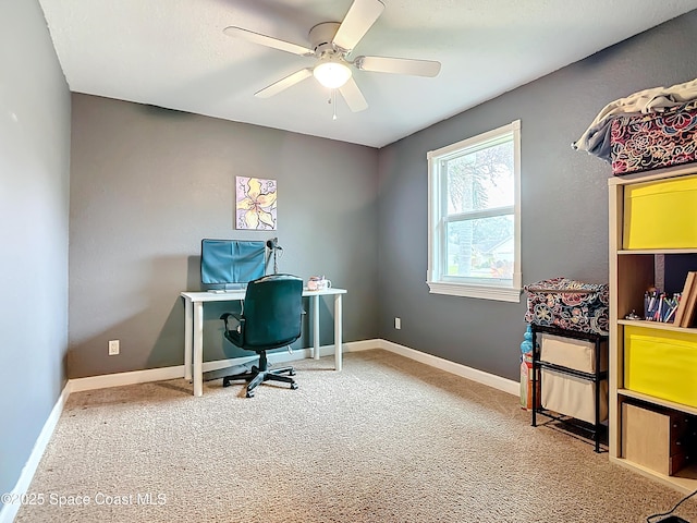 office with carpet floors and ceiling fan