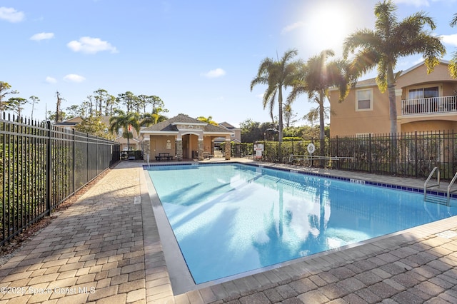 view of swimming pool featuring a patio