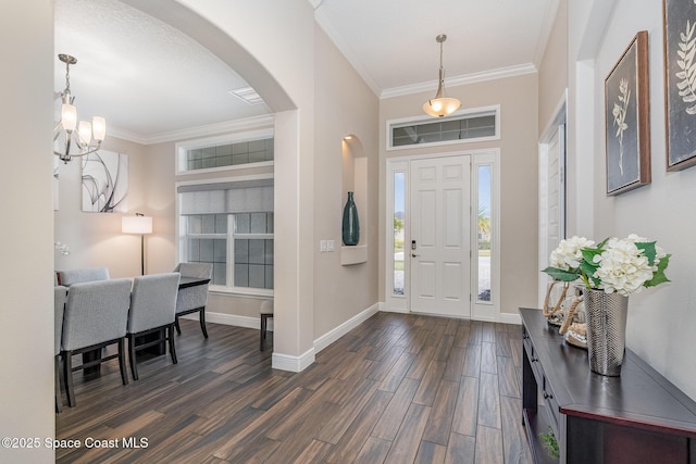 7690 Kerrington Dr, Melbourne, FL 32940 - foyer with dark wood-type flooring and ornamental molding