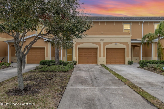 view of front of property featuring a garage