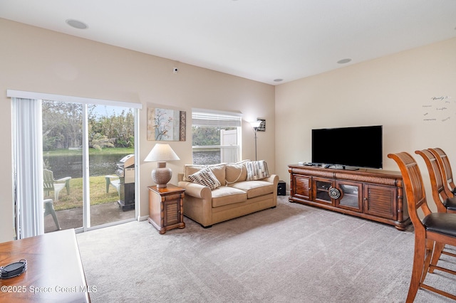 living room with light colored carpet