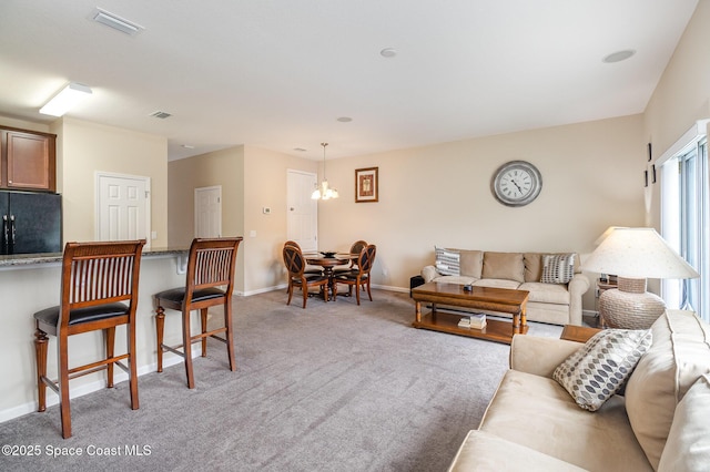 living room with light colored carpet