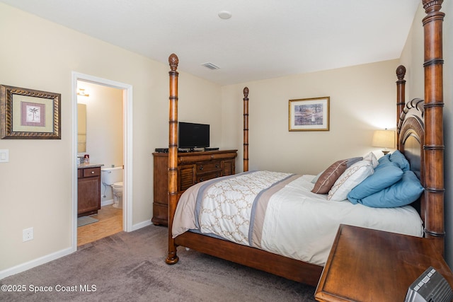 carpeted bedroom with ensuite bathroom