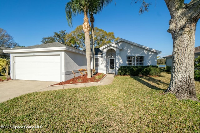 ranch-style home featuring a garage and a front lawn