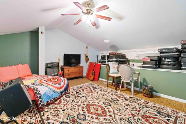 carpeted bedroom featuring ceiling fan and lofted ceiling