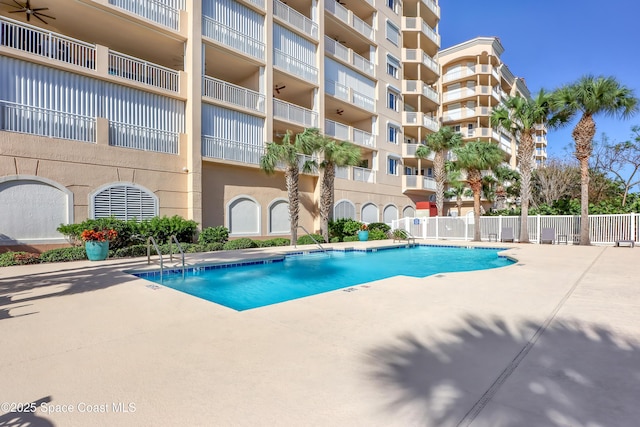 view of swimming pool with a patio