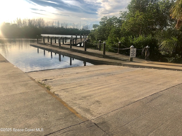 dock area featuring a water view