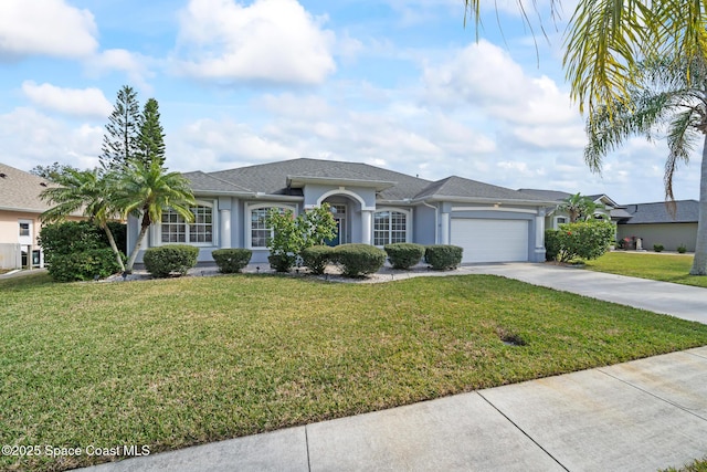 ranch-style home featuring a front lawn and a garage