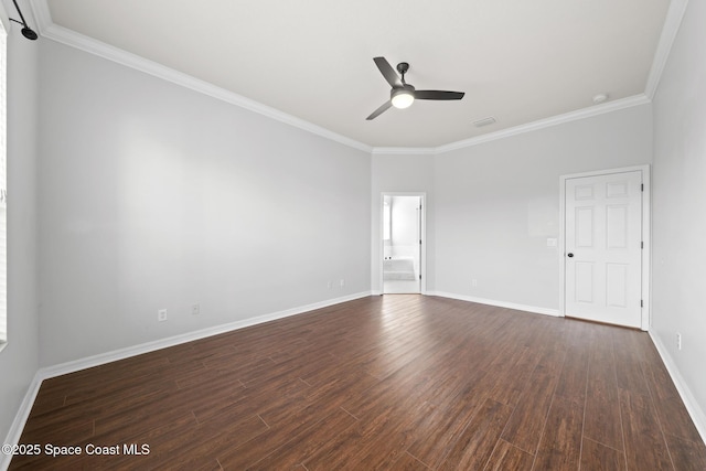 spare room with ceiling fan, dark hardwood / wood-style floors, and ornamental molding