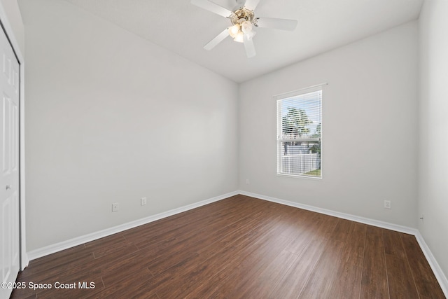 empty room featuring ceiling fan and hardwood / wood-style floors