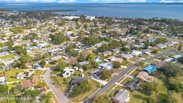 1008 Jersey St, Cocoa, FL 32927 - aerial view of property and surrounding area featuring a nearby body of water and nearby suburban area