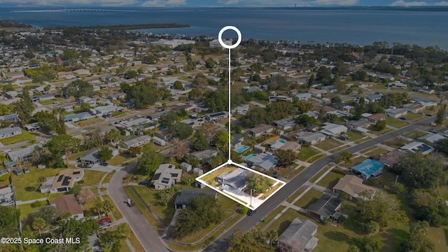 1008 Jersey St, Cocoa, FL 32927 - aerial view of property's location with property boundaries highlighted, a large body of water, and nearby suburban area