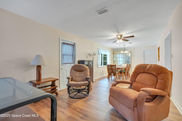 1008 Jersey St, Cocoa, FL 32927 - living area featuring a ceiling fan and light wood-style floors