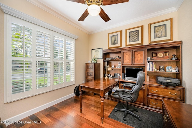 home office featuring ceiling fan, crown molding, and hardwood / wood-style flooring