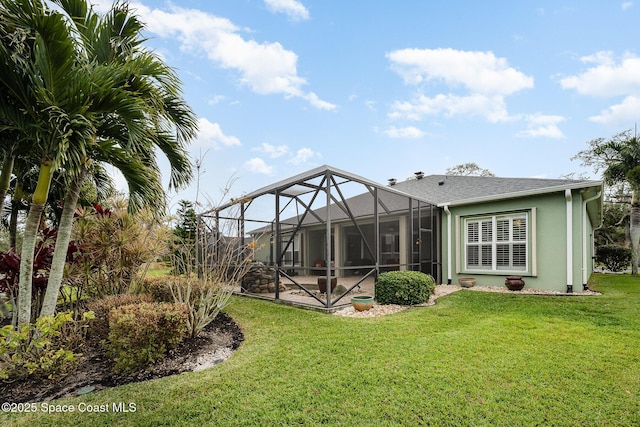 view of yard with a lanai