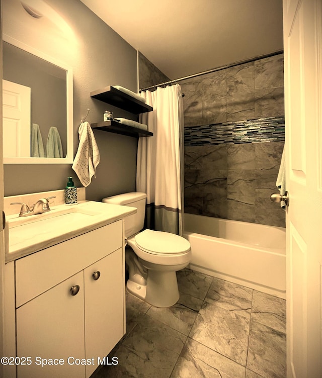 full bathroom featuring vanity, shower / bath combo with shower curtain, and toilet